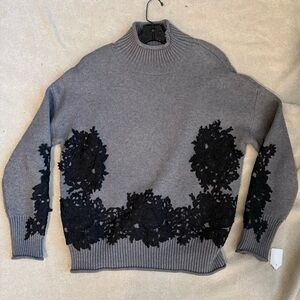 Chic Gray Turtleneck Sweater with Black Lace Accents